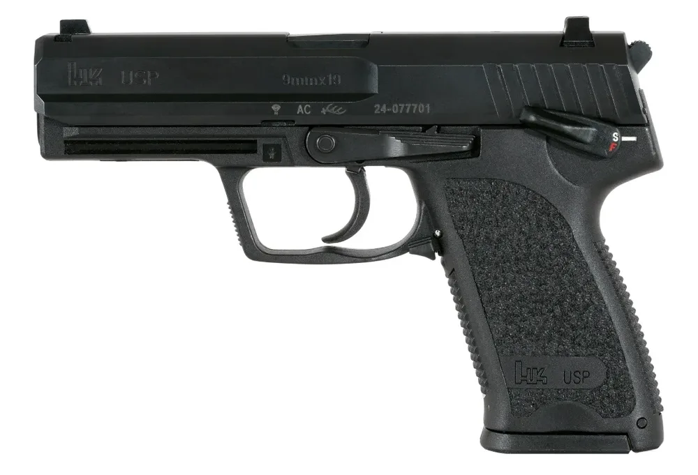 HK 81000309 USP V1 SA/DA 9mm Luger Caliber with 4.25" Barrel, 10+1 Capacity, Overall Black Finish, Serrated Trigger Guard Frame, Serrated Steel Slide & Polymer Grip Includes 2 Mags